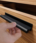 Self Adhesive Edge Finger Pull Door Handle Set Two Pack For Glass Wood Metal And Plastic Surfaces, installed on a wooden drawer