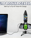 Self Launching Motorized Air Rocket Launcher For Kids With USB charging from a laptop, focusing on durability.