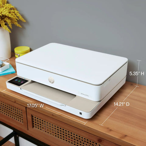 Front view of Envy 6155e Wireless All In One Color Inkjet Printer For Home Use With Duplex Printing Scan Copy AI Enabled And Instant Ink Trial Included No Fuss Easy Setup And Borderless Photo Printing on wooden desk.