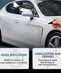 Person using Scratch Repair Pen For Cars Quick Easy Paint Touch Up That Fixes Scratches Chips And Scuffs In Seconds Waterproof And UV Resistant Works On All Colors Long Lasting Shine For Any Vehicle DIY Friendly on a white car with visible scratches.