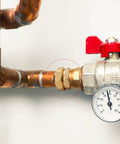 Real Solid 3/4 Inch Brass Pipe Union Fittings Three Pack Copper To Male Thread Sweat Plumbing Connectors, close-up view with valve.