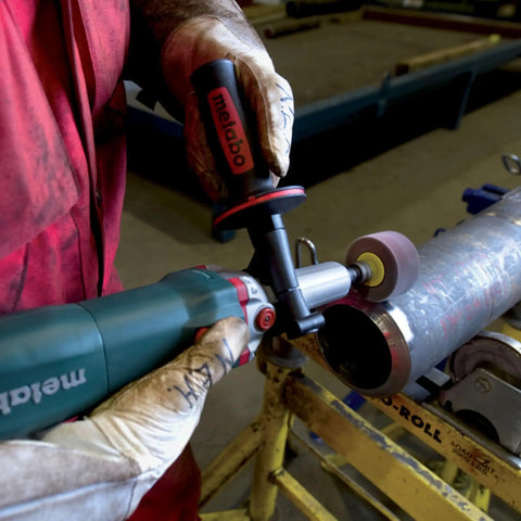 Heavy Duty Variable Speed Die Grinder With Badass High Torque Planetary Gears And Easy Swap Spindle Lock For Rock Solid Metalworking and finishing jobs featuring smooth nine hundred fifty watt motor in use on metal surface.