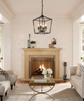 Living room with UL Listed Industrial Black Lantern Chandelier With Four Lights above coffee table and lit fireplace