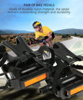 Durable Nylon Bicycle Pedals With Integrated Toe Clips And Straps For Spin Bikes And Kids Bikes Training Pedals With Non Slip Cages And Adjustable Straps One Pair on a scenic road.
