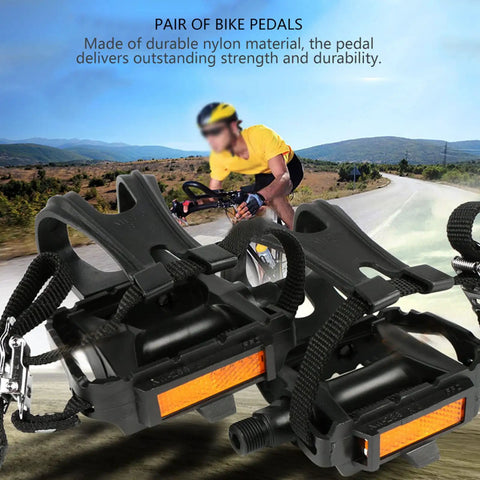 Durable Nylon Bicycle Pedals With Integrated Toe Clips And Straps For Spin Bikes And Kids Bikes Training Pedals With Non Slip Cages And Adjustable Straps One Pair on a scenic road.