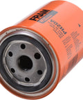 Close-up of Extra Guard PH20A oil filter showing metal base and orange casing for 10K mile change interval