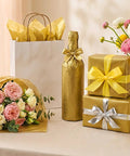 Gift display with gold metallic tissue paper pack 100 sheets 14 by 20 inches for gift bags and wrapping, festive flower bouquet.
