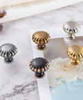 Round Antique Brass Cabinet Knobs 1-1/4 Inch, 10 Pack, Beefy Heavy Duty Metal Hardware With Rust Resistant Finish, Includes Two Screw Sizes 1 Inch And 1-1/2 Inch For Easy Installation On Kitchen And Bathroom Cabinets. Assorted finishes on round cabinet knobs