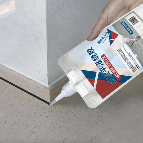 Hand applying Pro Grade Rock Solid Concrete Crack Sealant Waterproof Masonry Repair Adhesive along a concrete joint.
