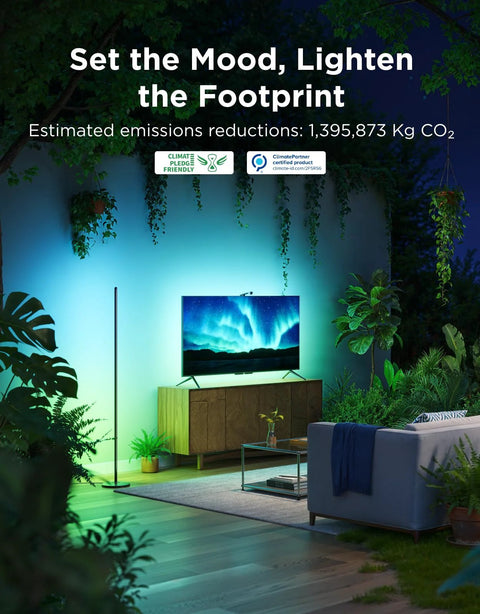 Govee RGBIC Floor Lamp Basic, black 1000lm LED corner standing lamp with teal ambient light beside TV in living room