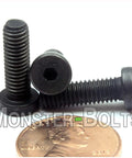 Top Shelf 10 32 X 5 8 Low Head Socket Screws Rock Solid Alloy Steel Fasteners with hex drive next to a penny.