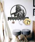 Personalized Badass Grim Reaper Key Holder With Custom Name Laser Cut Metal Skull Wall Mounted Key Rack with hooks in entryway.