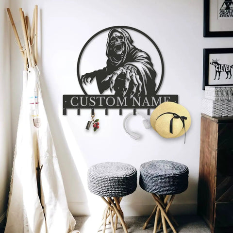 Personalized Badass Grim Reaper Key Holder With Custom Name Laser Cut Metal Skull Wall Mounted Key Rack with hooks in entryway.