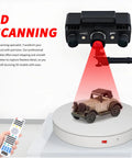 Heavy Duty Electric Rotating Turntable With Motorized Remote Control For 3D Scanning And 360 Video Shows Speed Adjustable Photography Display Stand Platform Supports Up To 400 Lb Load Capacity In White Finish showcasing a toy car being scanned.