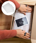 100 Count Reusable EPE Packing Foam Bags With Cushioned Design To Protect Fragile Items And Glassware, Ideal For Moving, Shipping, Storage, And Office Use, Pack Like A Pro With These Soft Cushioning Pouches For Safe, Easy Packaging. EPE foam bags in shipping box protecting photo prints