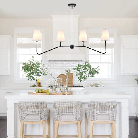 Classic Linear Linen Pendant Light With Off White Fabric Shade 4 Light Sleek Modern Kitchen Island Chandelier over a white kitchen