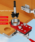 Stainless Steel 35mm Cup Hinge Drill Guide Jigs with Ball Bearing Guide positioned on wooden cabinet for precise assembly.