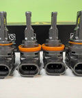 H11 H9 And 9005 HB3 Light Bulbs Combo Pack Of 4, 120000 Lumen Output, shown on table in front of its packaging