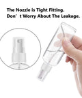 Person holding 2 Pack 1Oz Clear Plastic Travel Spray Bottle showcasing nozzle and tight cap, designed for leak-free usage.