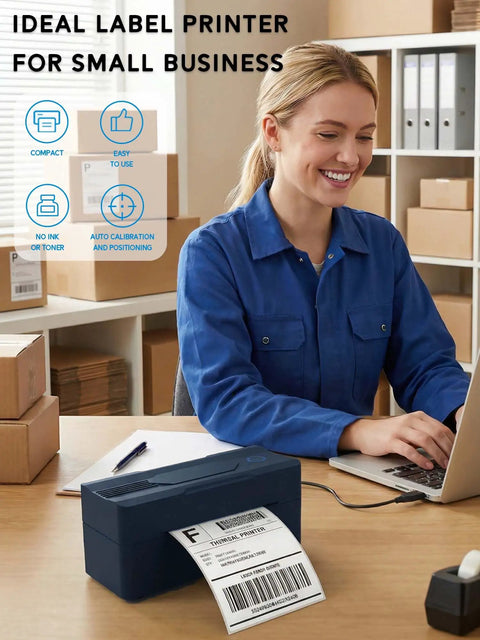 Person using Bluetooth 4x6 Thermal Shipping Label Printer For Small Biz Wireless Label Printer For Android iPhone Windows Mac Budget Friendly Setup Great For Amazon Etsy USPS And More on desk with cardboard boxes.