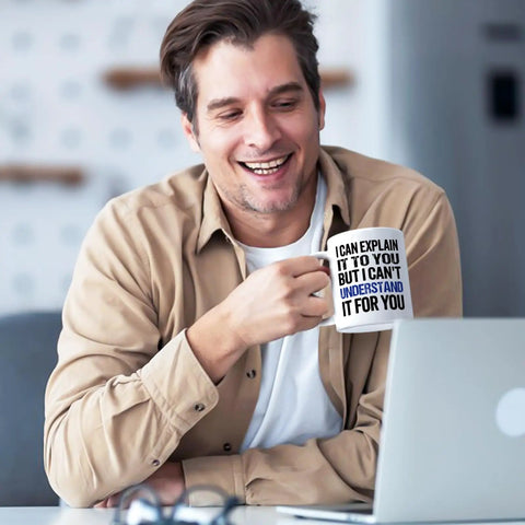 Man holding Funny Engineer Coffee Mug I Can Explain It To You But I Cant Understand It For You Gift For Engineers Teachers Managers Coworkers