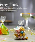 Clear Cellophane Bags For Favors Pack Of 200 For Birthday Parties 6x10 Inch Transparent Goodie Bags With 4 Inch Twist Ties filled with candies on a table