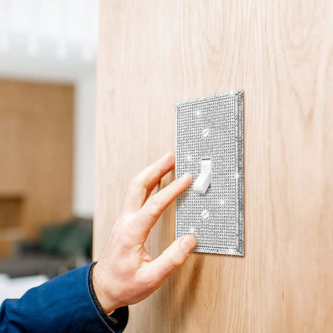 Two Piece Bling Light Switch Cover Set With Silver Rhinestones Stainless Steel Wall Plate For Single Toggle Switch shown on wall