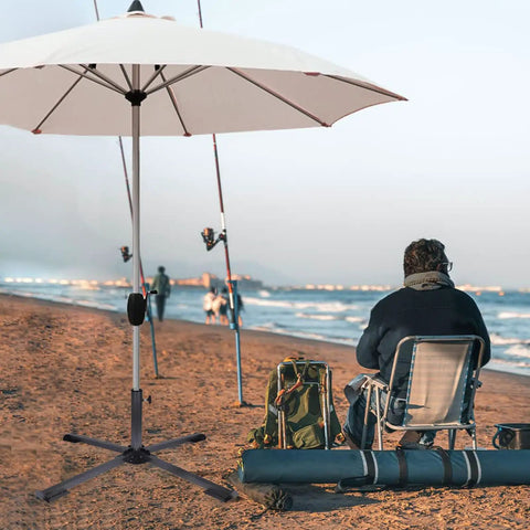 Heavy Duty Foldable Beach Umbrella Stand With Universal Clamp That Fits Poles From One Inch To One And A Half Inches on sandy beach
