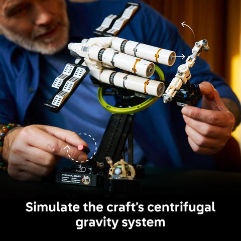 Person adjusting the Project Hail Mary Microscale Spacecraft Model Collectible Set For Adults, 11389 with gravity system feature.