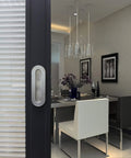 Stainless Steel Oval Recessed Sliding Door Flush Pull Handle 120mm By 40mm Brushed Satin Nickel Finish 304 Stainless Steel With Concealed Screws Pack Of 2 For Pocket Doors Barn Doors Suitable For Sliding Wardrobe Doors And Modern Interiors in a modern dining room setting