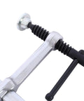 Close-up of bar clamp from Heavy Duty Rubber Wood Workbench With Bar Clamps For Garage Diy And Welding Station.