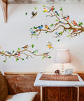 Hummingbird On Tree Branch Wall Sticker Set With Green Leaf And Flying Bird DIY Vinyl Wall Decal in a cozy room setting.