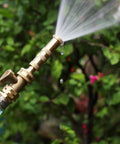 Heavy Duty Brass Garden Hose Shut Off Valve With Three Quarter Inch Male And Female Connectors spraying water