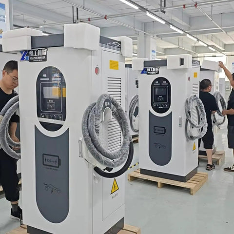 Heavy Duty Commercial Electric Vehicle Charging Station Standalone Level 3 EVSE Fast Charger for Farming and Construction Fleets in a factory setting.