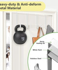 Over The Door Z Shaped Reversible Hooks For Clothes Coats Towels And Shoes Fits Doors With One And Three Eighths Inch Or One And Three Quarters Inch Widths Black 10 Pack, showing heavy-duty metal hook holding a kettlebell and bags, highlighting material composition.