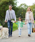 Family walking in park with dog, wearing Two Pack Sublimation Blank Bags With Adjustable Straps DIY Crossbody Bags For Sublimation Sport