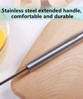 Close-up of stainless steel semi automatic hand push whisk blender for home kitchen with egg batter, no battery needed.