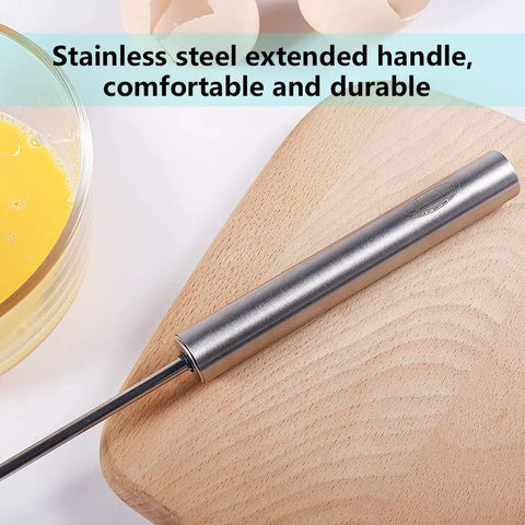 Close-up of stainless steel semi automatic hand push whisk blender for home kitchen with egg batter, no battery needed.
