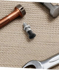 Slick Reset Spring Plunger With Steel Indexing Knob And Fine Thread Cut For Automotive Factories And Precision Gear Tuning on a textured surface.