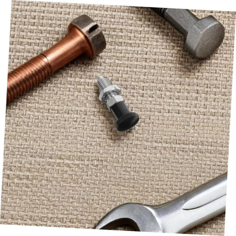 Slick Reset Spring Plunger With Steel Indexing Knob And Fine Thread Cut For Automotive Factories And Precision Gear Tuning on a textured surface.