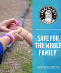 Person wearing Mosquito Repellent Bracelets For Kids And Adults, DEET-Free, Plant-Based Essential Oils, 12 pack.