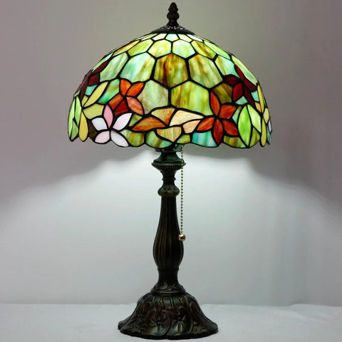 Classic Tiffany Style Table Lamp With Stained Glass Shade, 12 Inch Wide And 19 Inch Tall, Antique Bronze Base, illuminated