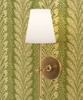 Elegant Gold Metallic Wallpaper Kickass Paste The Wall Install EcoFriendly PvcFree Wallcovering Made In Usa with a sconce light on green wall.