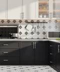 Modern kitchen with 10 pack brushed nickel cabinet knobs and drawer pulls set in solid zinc alloy installed on black cabinets.
