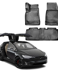 Precision Fit Tesla Model X 5 Seat Floor Mats 2016 To 2024 All Weather TPE displayed with trunk and footwell liners in black.