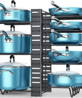 Heavy Duty Adjustable Pots And Pans Organizer Under Cabinet With Anti Slip Rubber Dividers Tight Fit Home Kitchen Storage Rack displaying blue cookware on a metal rack.