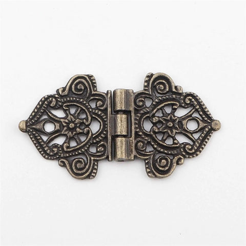 Antique Bronze Cabinet Hinges 24x54mm 2 Pack Decorative Wood Box Hinge With Hollow Flower Design lying flat, intricate details visible