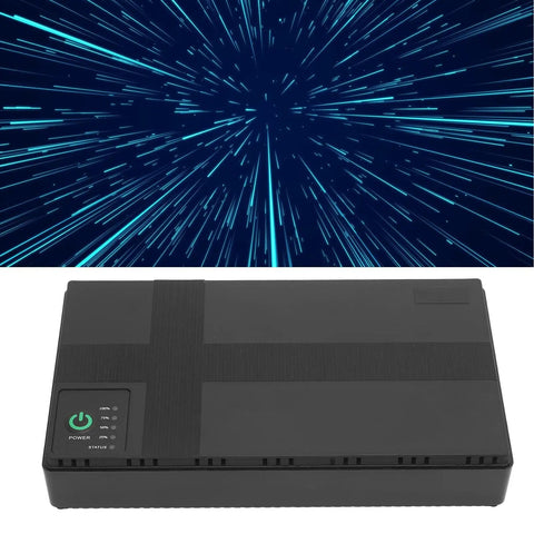 Portable UPS Battery Backup Stores 20000 Mah Of Ready To Go Juice For Cameras Routers And Media Devices Delivers steady voltage in black design.