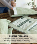 Person handling Extra Large 14x19 Inch Poly Mailers Pack Of 50 Self Sealing Waterproof And Tear Proof Envelopes For Clothing Shipping With Sage Green Boho Design.