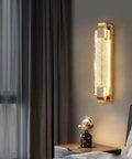 Slick Modern Crystal Wall Sconce Lights For Cozy Bedroom And Living Room Vibes With Up Down Led Wall Lamp Fixtures In A Solid 2 Pack For Indoor Outdoor Bathroom Decor, mounted on a wall beside a bed.